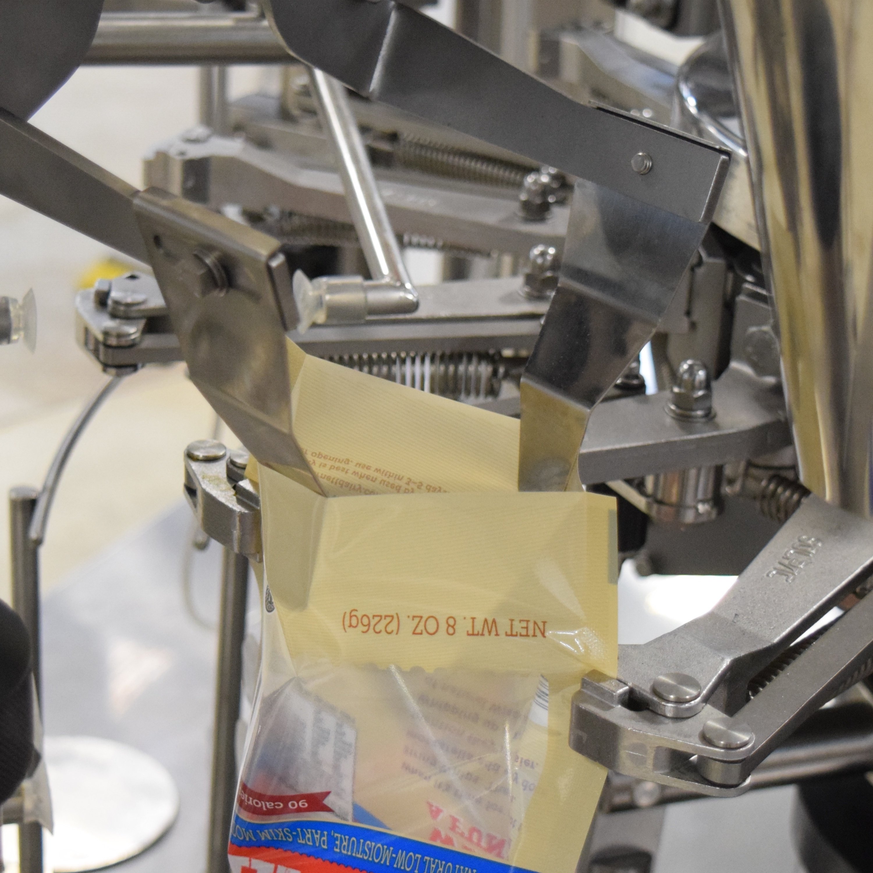 Premade_Pouch_Packaging_Machine_Bag_Opening_SImplex-707409-edited.jpg
