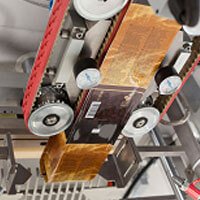 Coffee being packaged in a machine