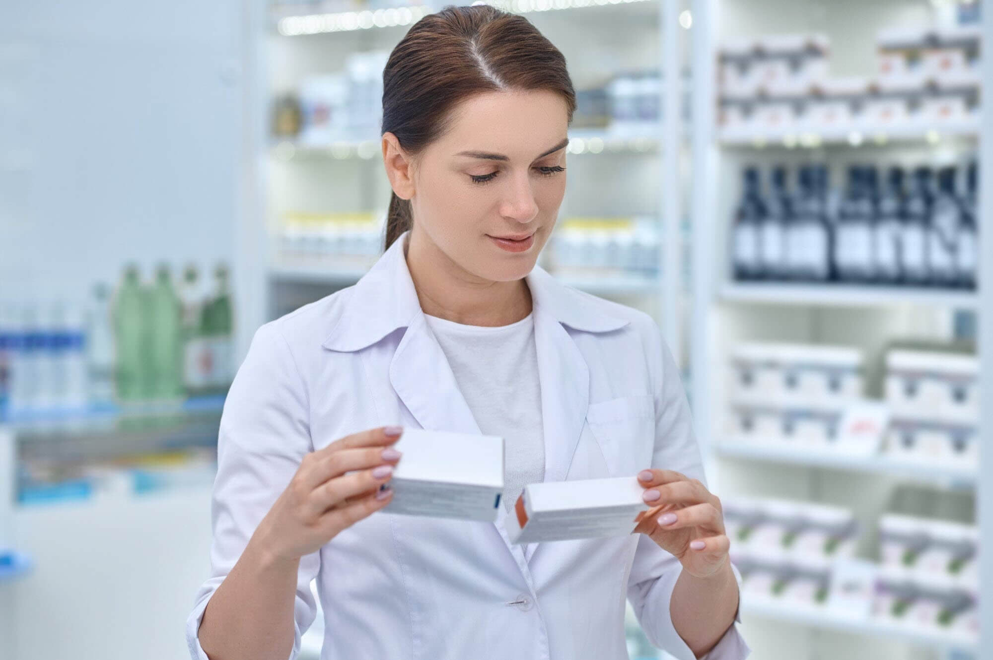 women looking at pharmaceutical packaged products