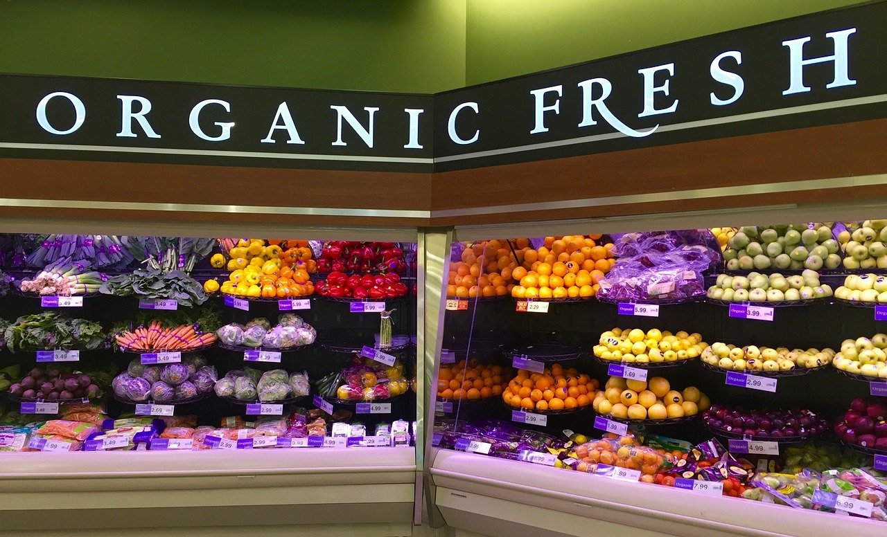 Fresh cut fruit in plastic take away containers a a Whole Foods in