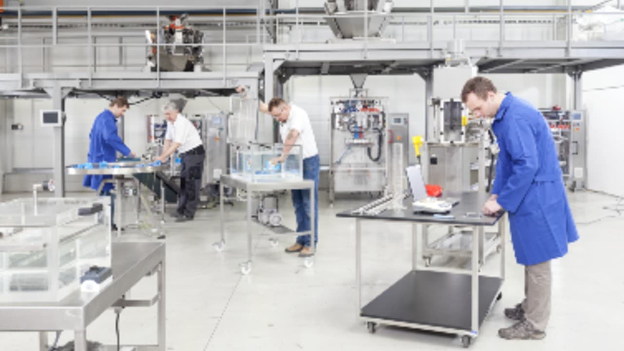 Viking Masek employees working